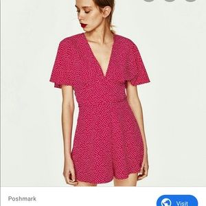 Pink polka dotted romper with keyhole back